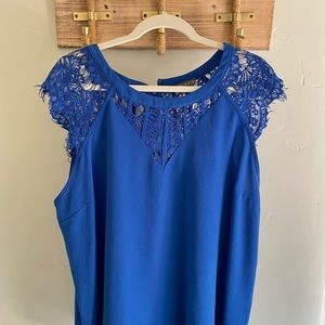 Blue lace top, great for work or date night